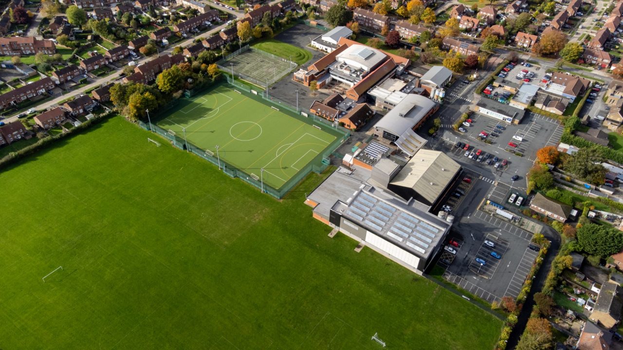 Aerial photo of the the town of Woodthorpe, it's a suburb in the south west of the city of York, North Yorkshire, England showing an aerial view of residential housing estates in the town.